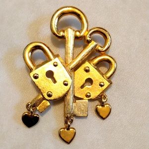 RVP locks and keys, dangling hearts brooch.